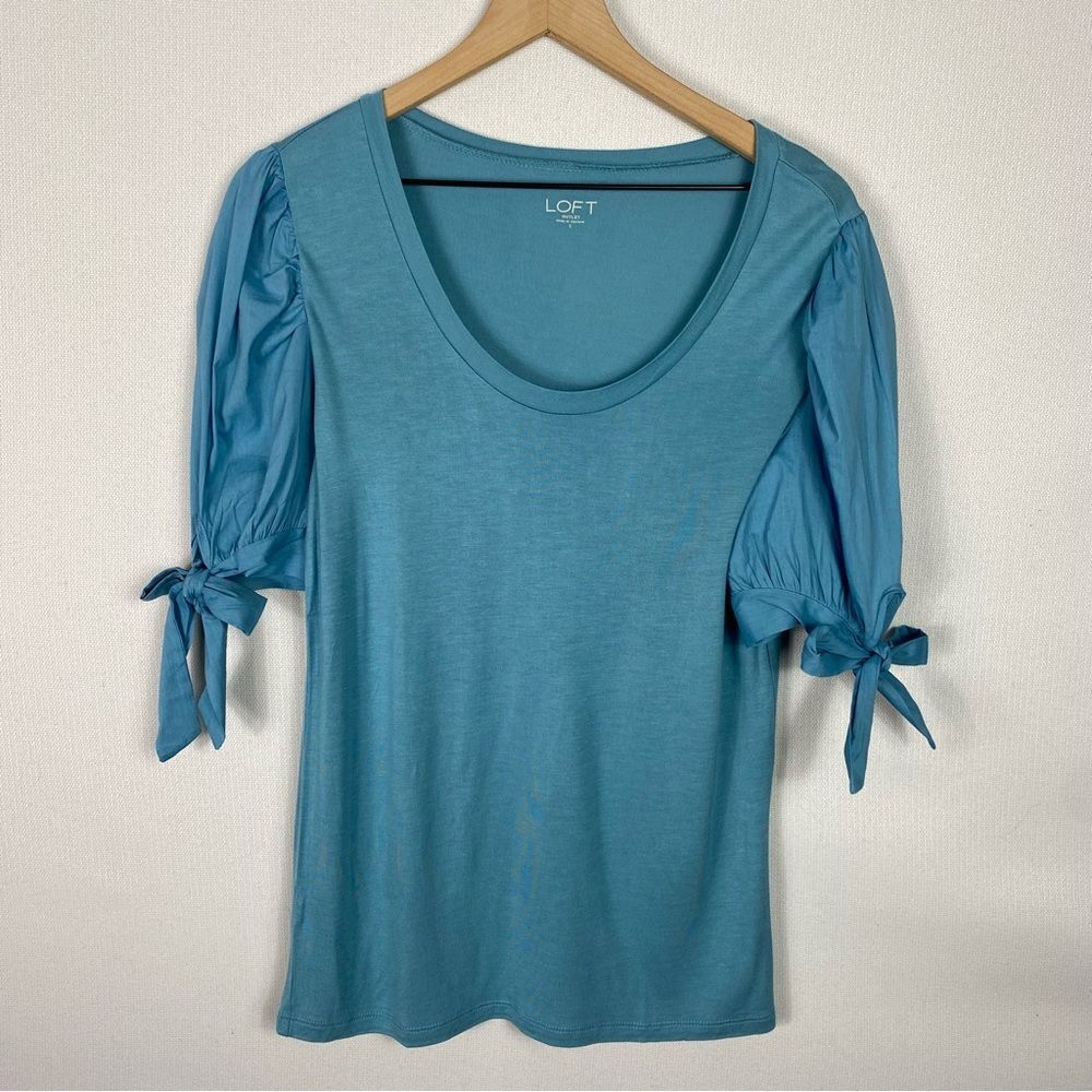 Loft Blue Peplum Top with Detailed Bow Ties around arm